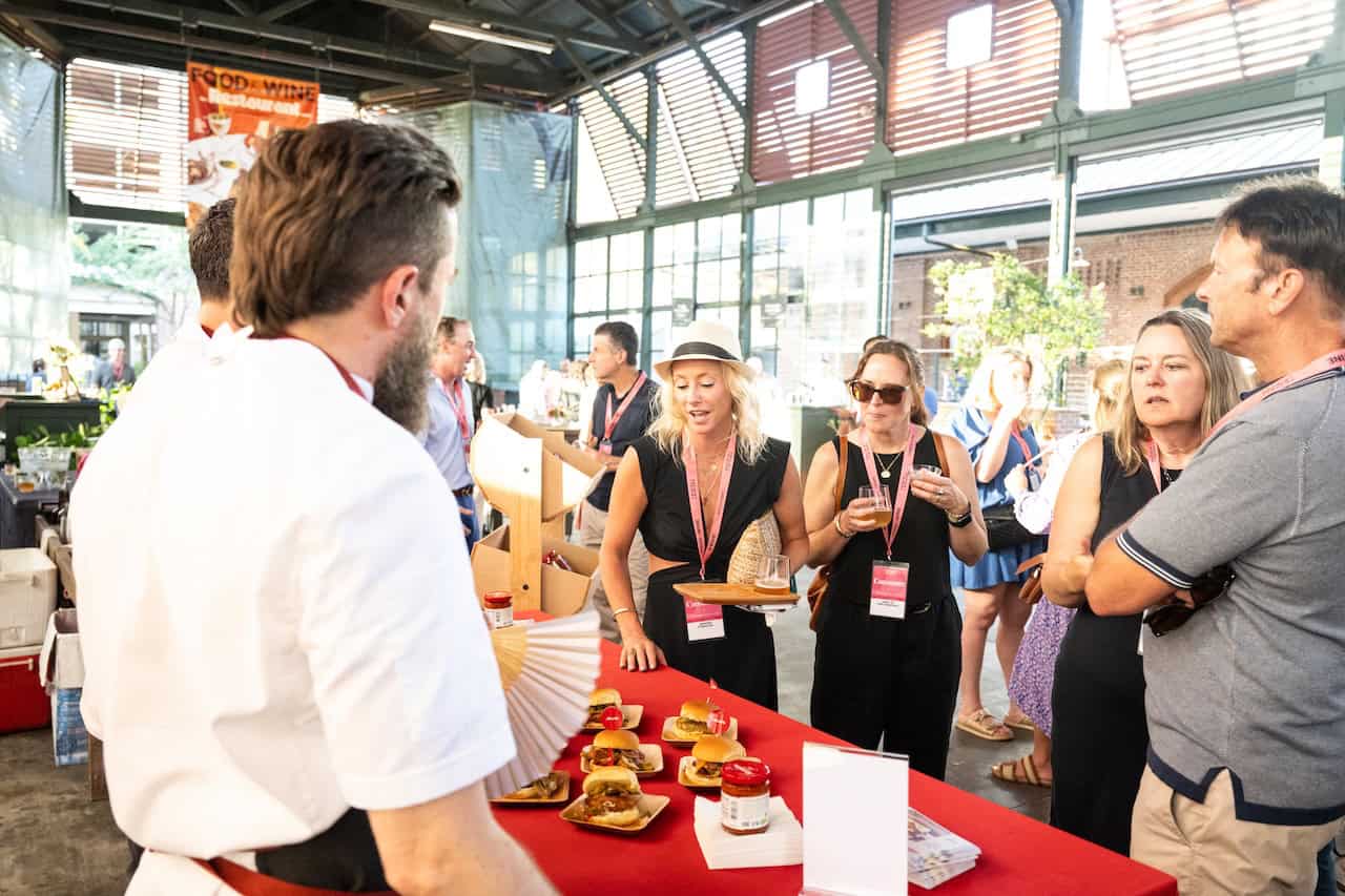 Guests enjoying the Grand Tasting at the Food & Wine Classic in Charleston